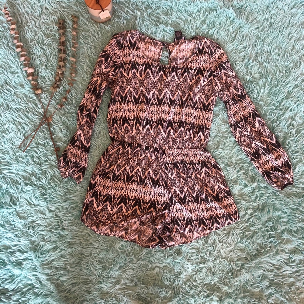 Long sleeve, pocket romper.